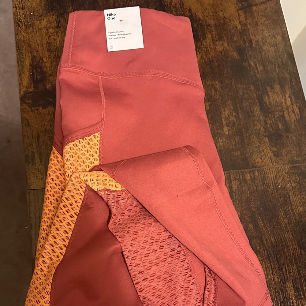 Nike Women's Leggings in Coral and Peach